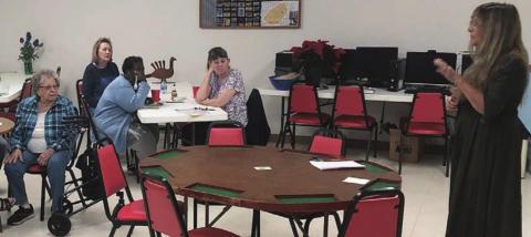 Speaker – Elizabeth Olsen (standing at right), local Air bnb owner, was the NVCC lunch-and-learn speaker on Monday, Dec. 6.