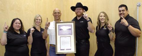 Displaying the Club Purple status received by Anytime Fitness in Schulenburg are (from left) Amanda Brown, club manager; Kim Bubela, owner/ trainer; Chip Bubela, owner; Mitchell Bailey, owner/regional manager; Lauren Ralph, head trainer; and Abe Centeno, trainer.