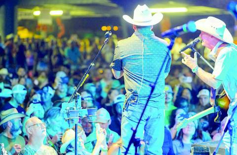 Fans fill the Wolters Park Pavilion for Saturday night’s performance by Dos Borrachos. Photo By Andy Behlen / Courtesy of Fayette County Record