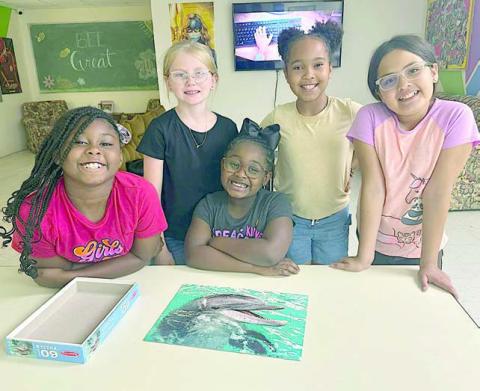 BGC members enjoy putting together puzzles During Power Hour at the Schulenburg Unit of the Boys &amp; Girls Club, members ages 6-18 are provided homework help, tutoring and high-yield learning activities. After Power Hour, the third grade girls enjoyed putting together a few puzzles. Shown are (from left) Ariann Wright, Brynlee Goode, Selby Harvell, Layla Thomas and Jocelyn Alejandres.