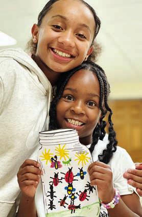 During arts and crafts at the Schulenburg Unit of the Boys & Girls Club, members “captured” and learned about different popular springtime insects. Shown are (from left) Ryleigh Steward and Ava Thomas.