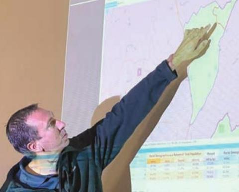 Precinct 1 Commissioner Jason McBroom points to the boundary line between Precinct 1 and Precinct 2. Precinct 2 will extend into an area that is currently in Precinct 1 if the redistricting map gets approved on Nov. 10. Photo By Melanie Berger / Courtesy of Flatonia Argus