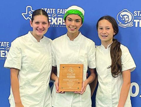 Reserve Champion Senior Team – The team of (from left) Elena Supak, Tori Newton and Eleanor Carey won first in the side dish category and reserve champion senior team.
