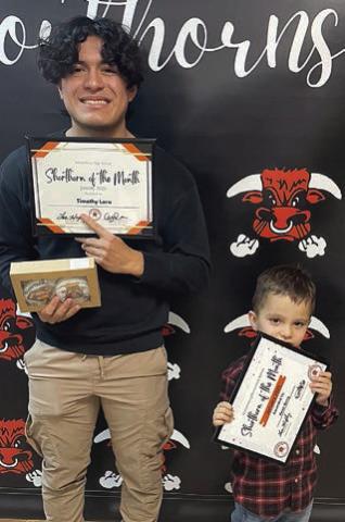Students of the month Announced as students of the month at Schulenburg ISD at the Board of Trustees meeting Monday night were: Timothy Lara (left), high school; Roan Berry (right), elementary; and (not shown) Derrick Adeogun, junior high. Sticker Photo By Darrell Vyvjala
