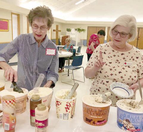 Ic e cream in a variety of flavors, along with toppings, was served at the Fayette County Retired Teachers Association meeting. Among the members enjoying the treat were (from left) Sandra Aschenbeck and Joan Miertschin.