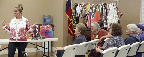 Patricia Roebuck (left) of Lola &amp; Viv Designs spoke at the Colorado Valley Quilt Guild meeting on how to turn old quilts into jackets and bags.