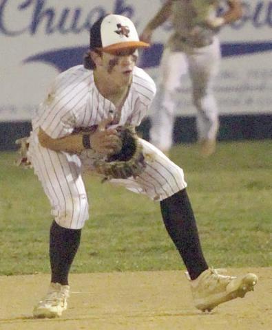 Second baseman Cooper Demel stays with a high hop on a ground ball for an out during last Tuesday’s game. Sticker Photo By Darrell Vyvjala
