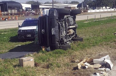 After tire deflation devices were deployed, the vehicle being pursued by law enforcement traveled a short distance and crashed, coming to a stop in the median.