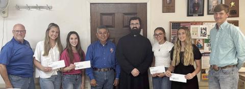 Weimar Knights of Columbus Council 2153 has announced its scholarship recipients for 2025. Shown at the presentation are (from left) Bear Kana, representing Council 2153; scholarship recipients Lily Berger and Erika Billeck; Joe Jimenez, Council 2153 grand knight; Fr. Chase Goodman, pastor of St. Michael Catholic Church in Weimar; and scholarship recipients Claire Pavlu, Samantha Lichnovsky and Logan Kainer.