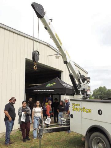 A truck-mounted boom was operated by eighth-grade students from La Grange ISD during a Career Quest session led by representatives from Mc-Court Equipment.