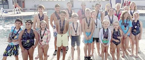 Sharks Swim Team concludes season at Meet of Champs