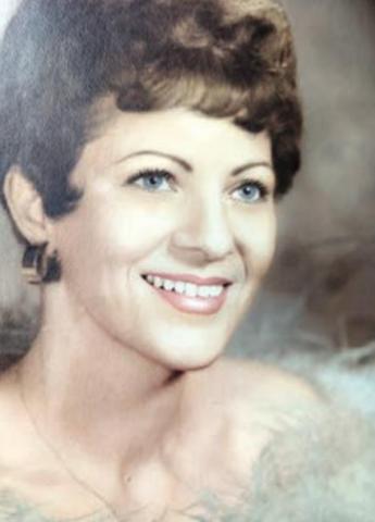 MARION J. KIKER