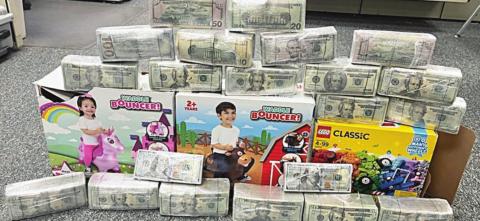 THE Three toy boxes with U.S. currency totaling $199,000 found during a traffic stop on Interstate 10 near Flatonia are shown above.
