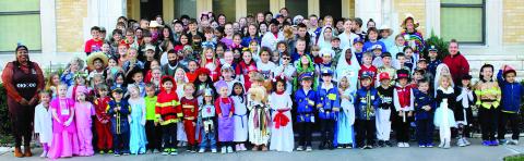 Students at St. Rose of Lima Catholic School in Schulenburg celebrated the All Saints Day Mass on Wednesday, Nov. 1. All students were encouraged to dress as a saint or a profession represented by a patron saint. Fr. Alex Aboagye reminded everyone that saints were people like them who did what God asked. The junior high students also participated in the All Souls Day Mass on Thursday, Nov. 2 and went to the cemetery with Fr. Jasper Liggio, Fr. Luke Prihoda and Fr. Alex Aboagye.
