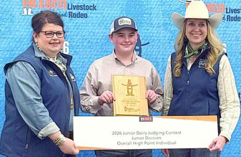 High point junior at the HLSR Dairy Judging Contest was Abraham McBride (center), pictured with two HSLR representatives. The HLSR event also served as the District 11 Dairy Judging Contest, in which McBride was high point intermediate.