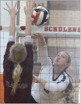 Reagan Dusek registers one of her 15 kills against Flatonia in the second set. Sticker Photo By Darrell Vyvjala