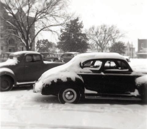 La Grange snow scene showing cars covered in snow on West Colorado Street in 1949. Heavy snow started falling late Saturday evening, Jan. 29 and continued until 3 p.m. on Sunday, Jan. 30 to a depth of six inches. The temperature fell to 2 degrees. Photo Courtesy of Fayette Heritage Museum &amp; Archives