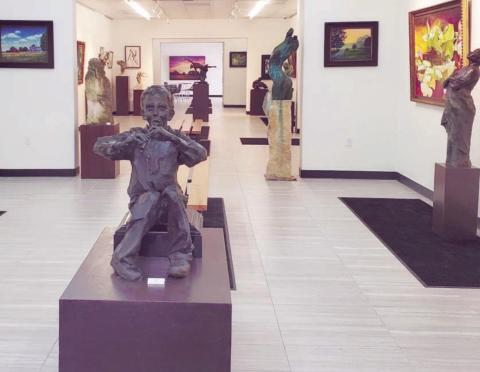 Sculptures and paintings on display at the Schulenburg campus of Arts for Rural Texas