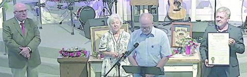 Presented to the congregation of First Baptist Church on Sunday, June 21 was a “Resolution on the Semiquincentennial Celebration of the United States of America.” Shown are (from left) Pastor David Thompson, and semiquincentennial advisory group members Donna McCollough, Jimmy Powell and Michael Jurica who holds the resolution.