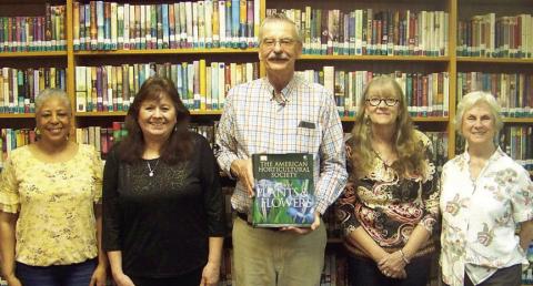 Garden Club donates book to local library