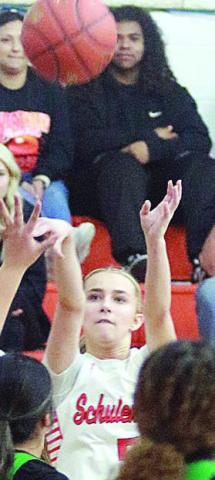 Jenna Guentert sends a trey on its way in the fourth quarter. Sticker Photo By Darrell Vyvjala