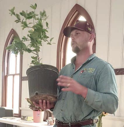 Speaker Colton Bubela focused his discussion on trees.