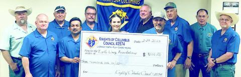 La Grange KCs donate to Turtle Wing La Grange Knights of Columbus Council 2574 presented Turtle Wing Foundation with a generous $3,000 donation recently. In attendance were (from left) KC members Richard Hoffmann, Marcus Recek, Randy Proske, Philip Rocha and Ralph Dunk; Turtle Wing executive director Destiny Psencik; and KC members Charles Youngblood, Hector Cervantez, Pat Lyons, Gary Antosh and Jim Kothmann.