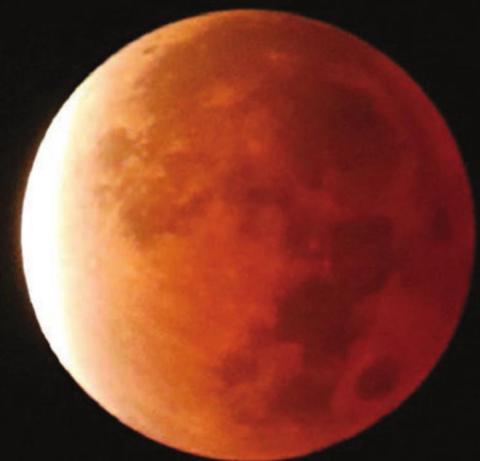 CHARLES ASCHENBECK took this photo of the partial lunar eclipse.