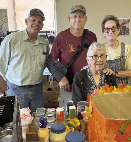 Dropping off food at the Schulenburg Area Food Pantry last month was Stephanie Shroyer (right), Senior Connections program director. She is shown with (from left) Mike Schindler, Jack Niesner and Delores Michalke all with the Food Pantry.