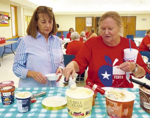 Enjoying ice cre am with a variety of topping at the FCRTA social were Patty Ehler and Donna Burton.