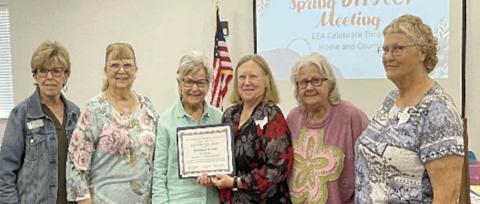 Accepting the 90th-year Club Award for Walhalla Extension Education Association Club were (from left) Sally Garrett, Fayette County Extension Agent-FCH; and Janice Alexander, Lila Garlin, Donna Burton and Helen Wagner, Walhalla Club EE members. Also shown is (right) Knellen Quinteros, District 11 EE director.