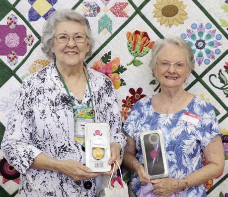 The Colorado Valley Quilt Guild’s “Cut Above” award went to Jo Anne Hill (left) and Pat Scherer (right).