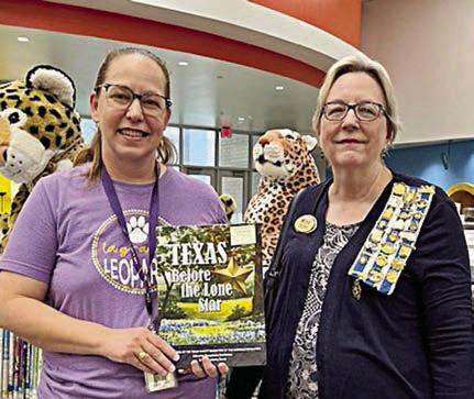 LA GRANGE ELEMENTARY presentation – (from left) Amy McCord, La Grange Elementary library; and Kim Joost, chapter librarian, Smith-M cMIllan Chapter, NSDAR.