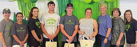 Turtle Wing gives scholarships to four students