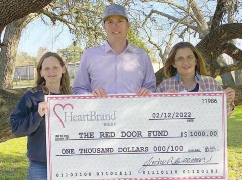 HeartBrand Beef in Flatonia held a special promotion from which a $1,000 donation was made to the Red Door Fund. Shown are (from left) Christine Mulholland, Red Door fund advisor; Jordan Beeman, owner, HeartBrand Beef; and Vicki Hudec, Red Door fund advisor.
