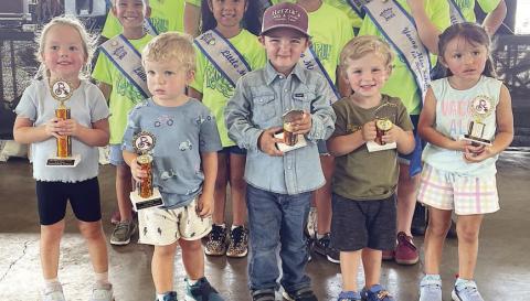 2- & 3-year-olds – (front, from left) Anna Janecka, first place; Landon Venghaus, second place; Carson Herzik, third place; Carter Oncken, fourth place; and Emily Moreno, fifth place. Sticker Photo By Darrell Vyvjala