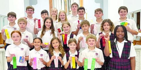 WiNNers from St. Rose of Lima Catholic School in the District 38AA PSIA Academic Meet were (front row, from left) Rowan Heinrich, Emma Zweschper,  Margot Machac, Harper Wright, Benjamin Sustr, Ava Boston, (middle row) Sebastian Lincoln, Brielle Goedrich, Emileigh Divin, Kasen Zbranek, Lane Schiffli,  (back row) Luke Goedrich, Levi Johnson, Micah Garcia, Cate Hooper, Briley Hartensteiner, Kaleb Zapalac, Cal Schiffli, Jack Schiffli and Noah Heger.