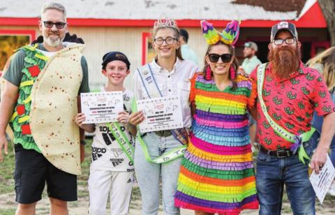 DASH WINNERS – (from left) Chris Hooper, representing Turtle Wing; Charlie Shank, junior high winner, C.J. Prihoda, adult female winner; DeeAnn Hooper, representing Turtle Wing; Rooster Hoffman, adult male winner; (not shown) Kenny Houston, pre-K/K winner; and Braxton Howlett, elementary winner.