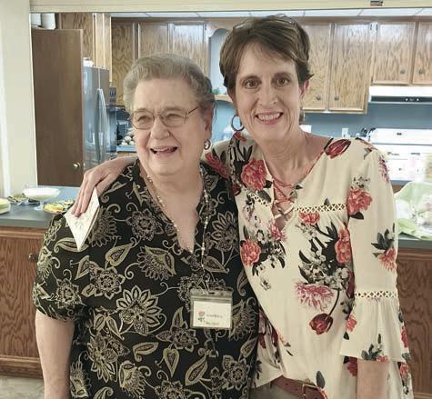 New member of the Garden Club Lisa Dennis (right) is shown with president Janet Kobza (left).