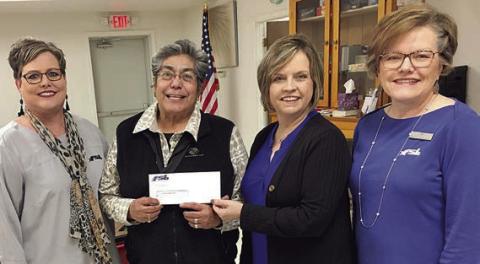 Presenting a $500 do nat ion from Fayette Savings Bank for programs at Senior Connections are Cheryl Brossmann (left), FSB-Schulenburg, , Jennifer Moring (second from right), FSB-Weimar and Jyl Stavinoha (right), FSB Flatonia. Accepting the check is Cindy Villarreal (second from left), Senior Connections executive director.
