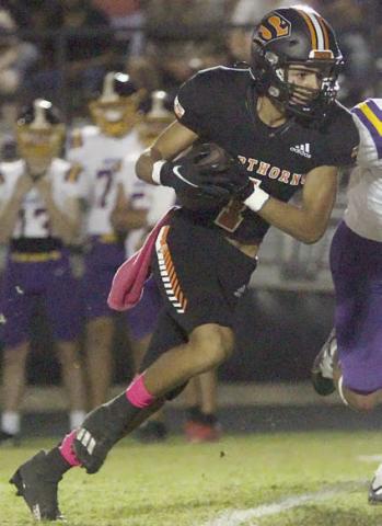 Jose Cortez heads upfield on a second-quarter reception for 18 yards on fourth and 7. Sticker Photo By Layne Vyvjala