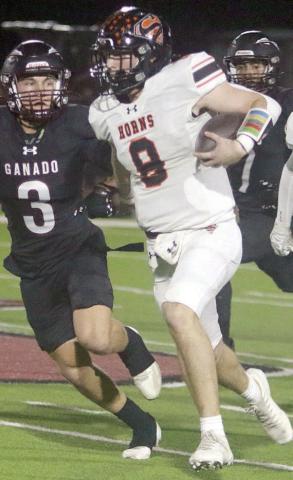 Owen Brenek takes a fake punt for 24 yards in the second quarter. Sticker Photo By Darrell Vyvjala