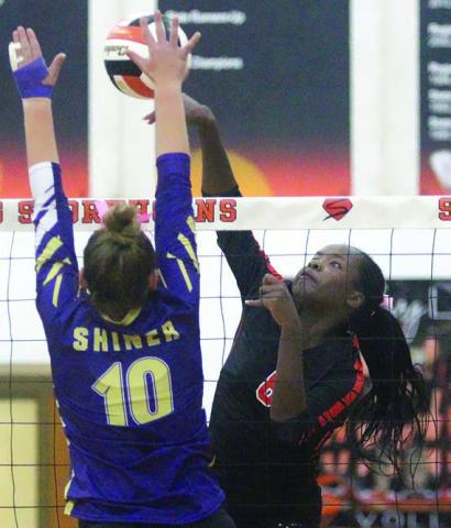Jessalyn Gipson gets one of her 18 kills last Tuesday early in the fifth set. Sticker Photo By Darrell Vyvjala