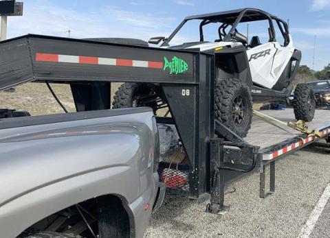 A POLARIS RZR REPORTED AS STOLEN out of Jonesboro, Arkansas was located during a traffic stop on I-10 near Flatonia. The Polaris was on a trailer being pulled by a 2006 gray GMC 3500 dually.