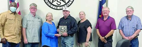 Plaque presented to Strickland