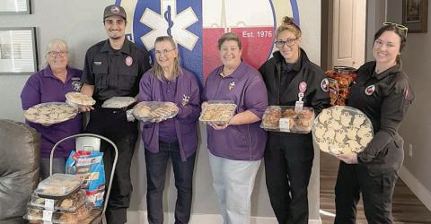 Donation to Fayette County EMS – Shown at the Schulenburg EMS Station with the donations are (from left) Phyllis Valchar, Court St Rose recording secretary; Alex Moniz, representing Fayette County EMS; Barbara Veselka, representing Court St. Rose; Grace Lebeda, Court St Rose regent; and Taylor Silva and Madison Whitney, representing Fayette County EMS. Not shown is Sheila Brossmann, representing Court St. Rose.