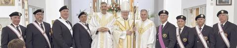 4th degree KCs lead procession for bishop at St. Rose confirmation Mass