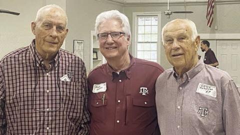 First in the meal line were those from the oldest class – Vernon L. “Chick” Hohensee of Fayetteville (right, class of 1957) and William L. “Bill” Appelt of Hallettsville (left, class of 58). Also shown is Mark Hebert (center, class of 1978).