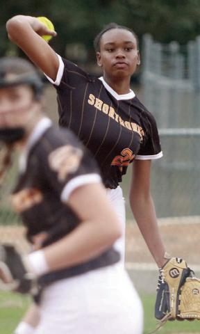 Third baseman Jashiya Jackson fires to first base to get an out against St. Paul. Sticker Photo By Darrell Vyvjala