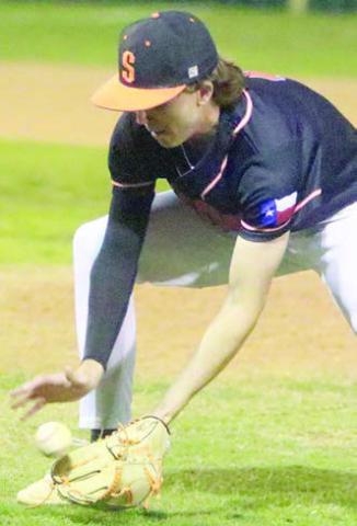 Nick Goode fields a come-backer for the second out in the seventh inning against Shiner. Sticker Photo By Darrell Vyvjala